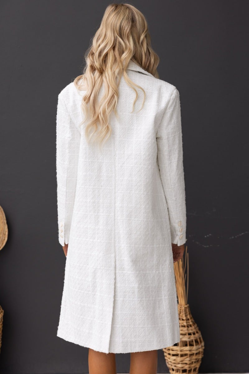 Back view of Zadie Coat in white tweed, featuring longline fit, collar, and back split detail.
