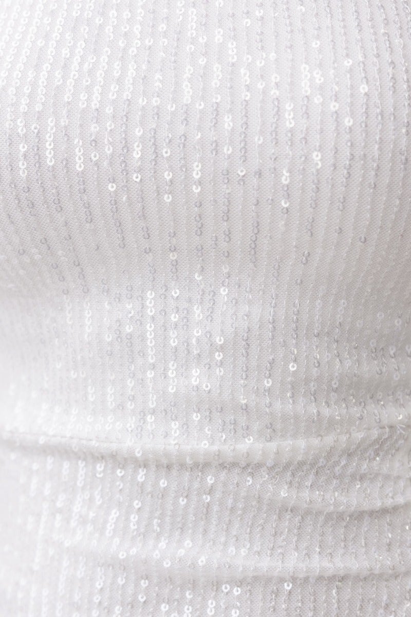 Close-up of the sequin detailing on the Wish On A Star Dress, showcasing its delicate texture and shimmer.
