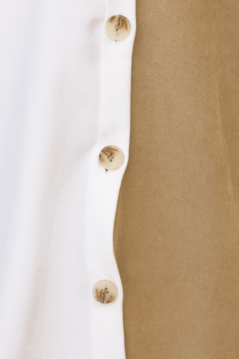 Detail of Baxter Shirt showing button-up front and contrasting fabric colors.
