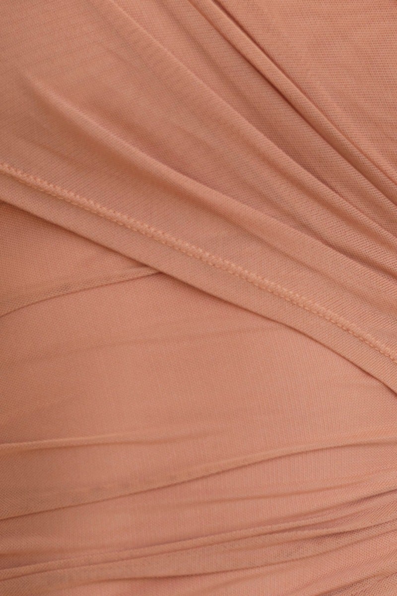 Close-up of the peach mesh fabric featuring ruching details for the Idina Maxi Dress.