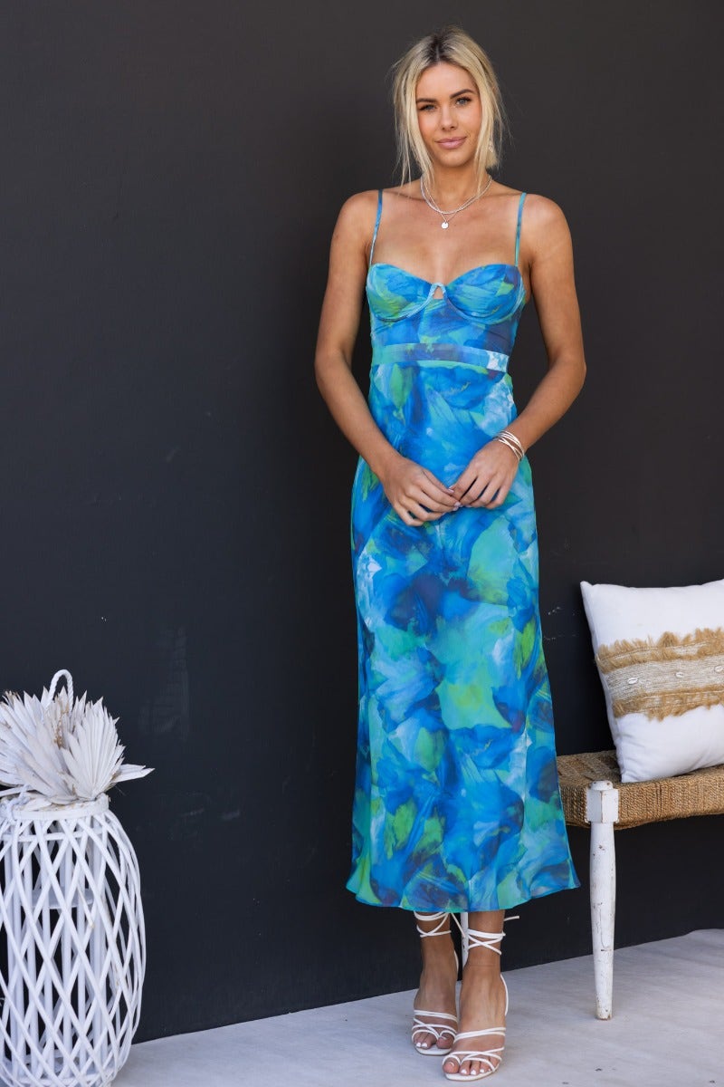 Rhai Midi Dress features adjustable straps and a multi-colour print, perfect for a stylish summer look.