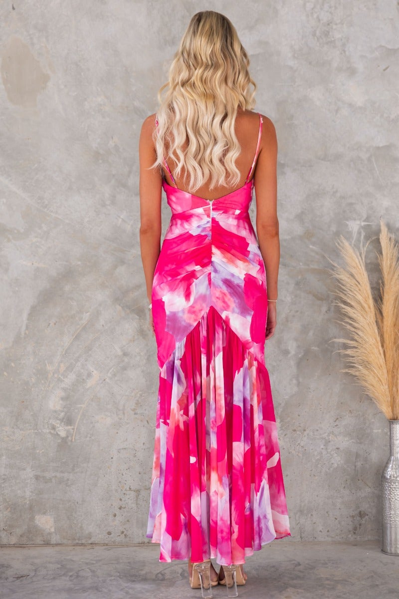Back view of a floral print Forget Me Maxi Dress with adjustable straps and padded bust, perfect for summer events.