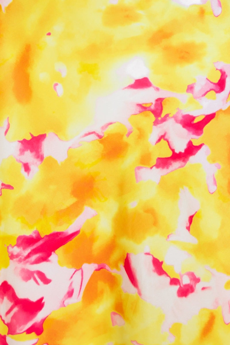 Vibrant abstract pattern in yellow and pink tones, ideal for an electric touch maxi dress.