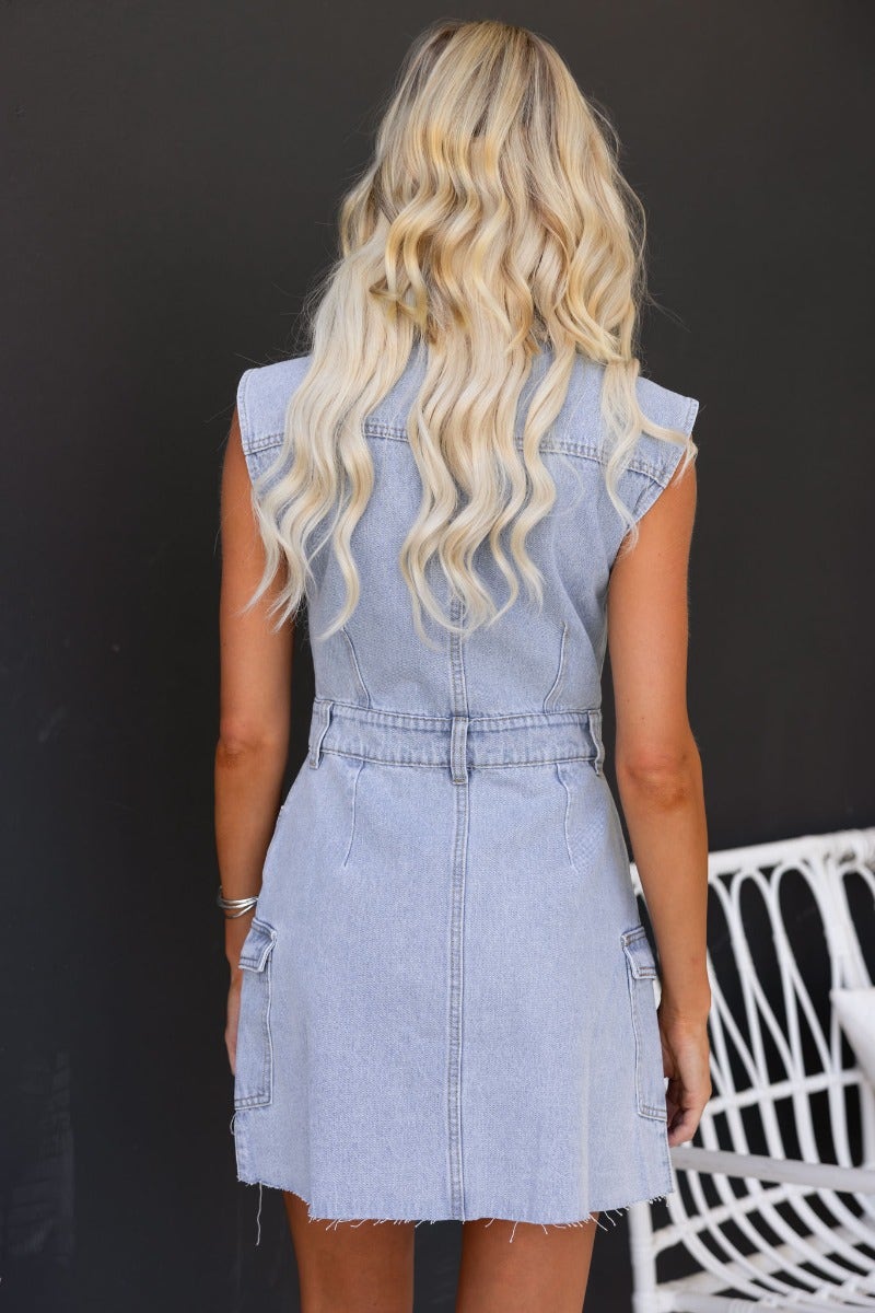 Back view of a Hold Tight Denim Dress featuring a collar, button-up design, and pockets.