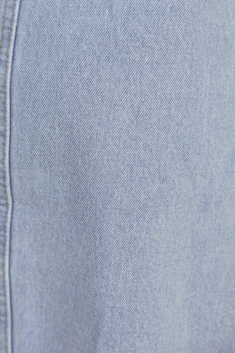 Close-up of light blue denim texture, showcasing the fabric of the Hold Tight Denim Dress.