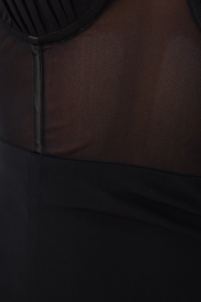 Close-up of the black Give Me Love Midi Dress showcasing adjustable straps and padded bust detail.