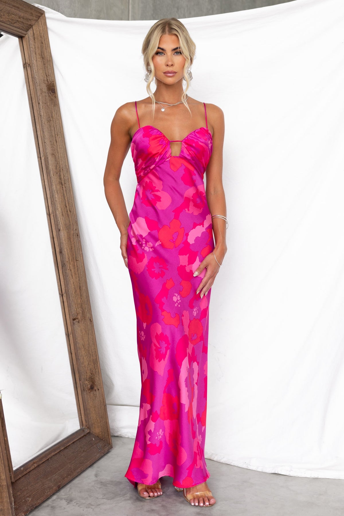 Floral print pink maxi dress with adjustable straps and key-hole detail at bust, perfect for summer occasions.