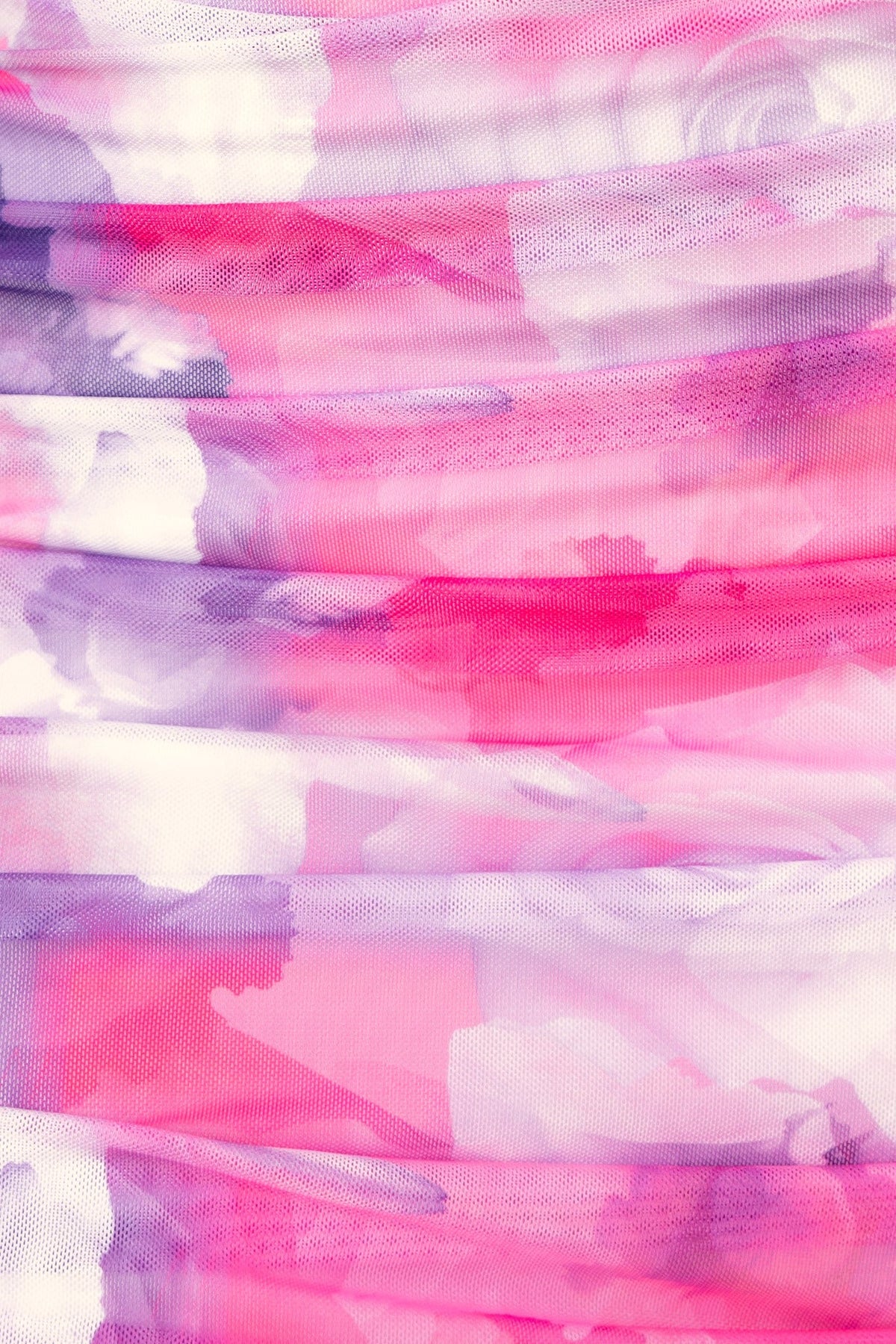 Close-up of the ruched fabric in pink and lavender shades of the Heart On Fire Maxi Dress.