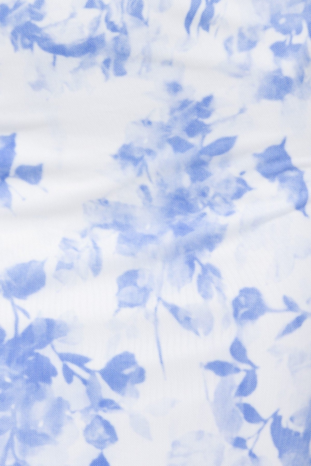 Floral print in soft blue shades, perfect for the Katia Maxi Dress, featuring delicate flower patterns on a light background.