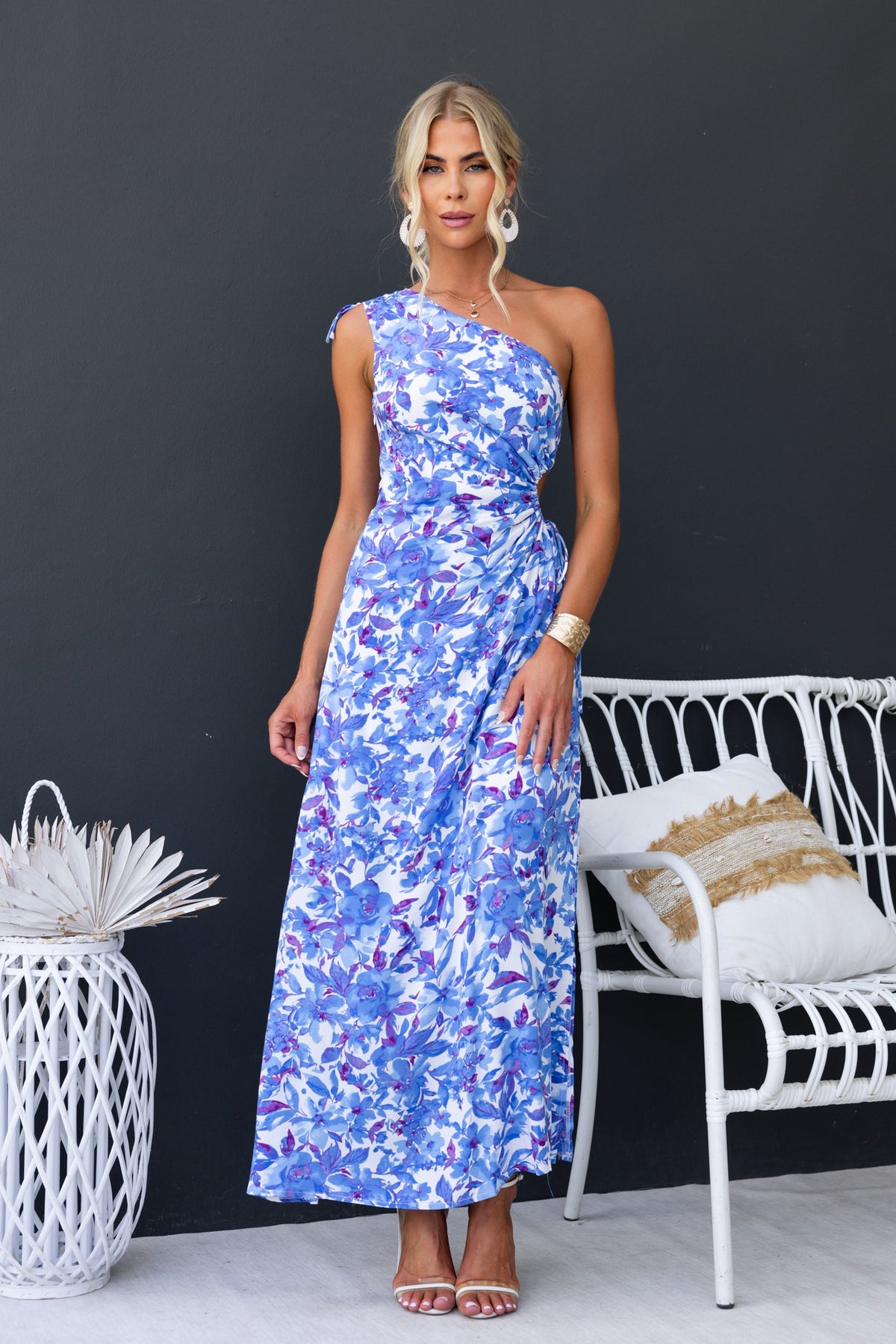 One-shoulder floral print maxi dress in blue, featuring adjustable ruching and side split.