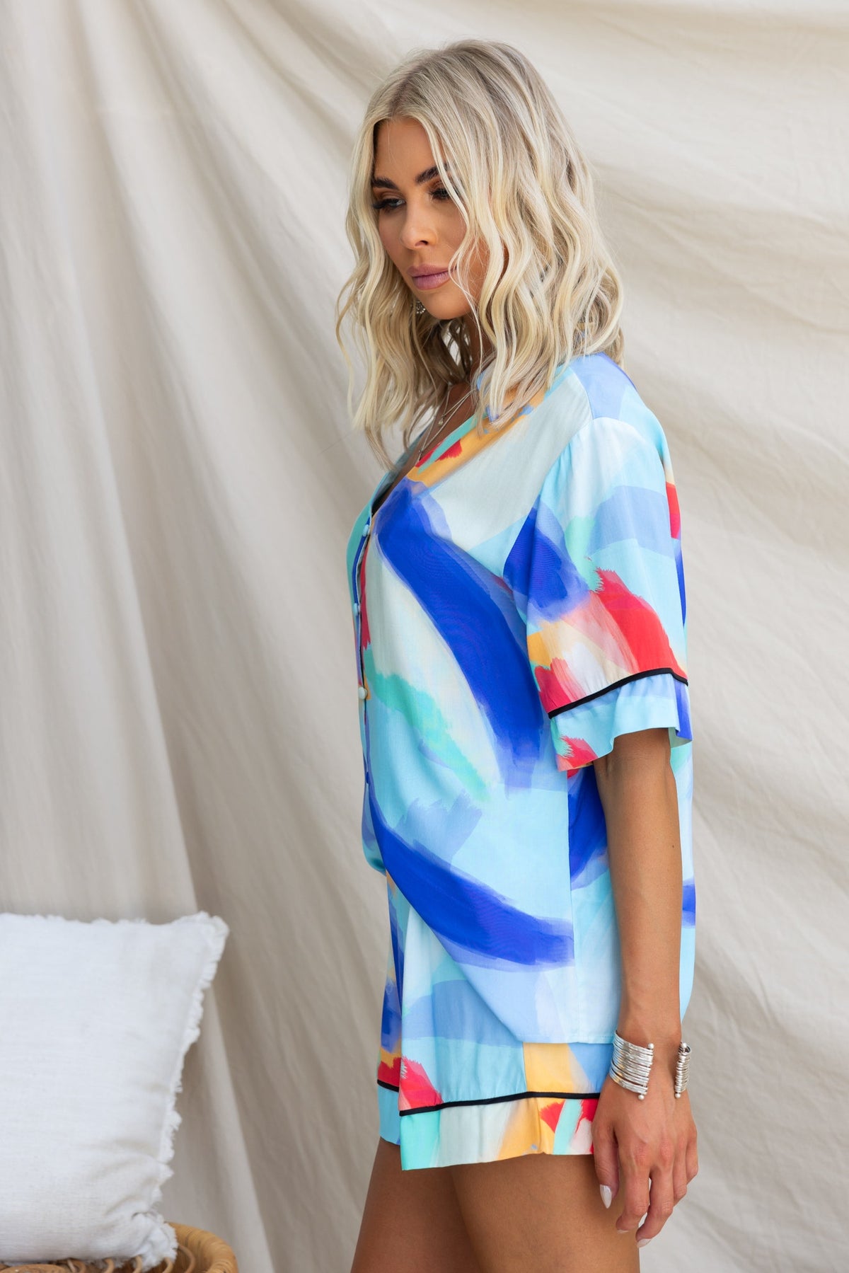 Stylish Focus Shirt featuring a vibrant watercolor print, button-up front, and relaxed fit, made from lightweight rayon.