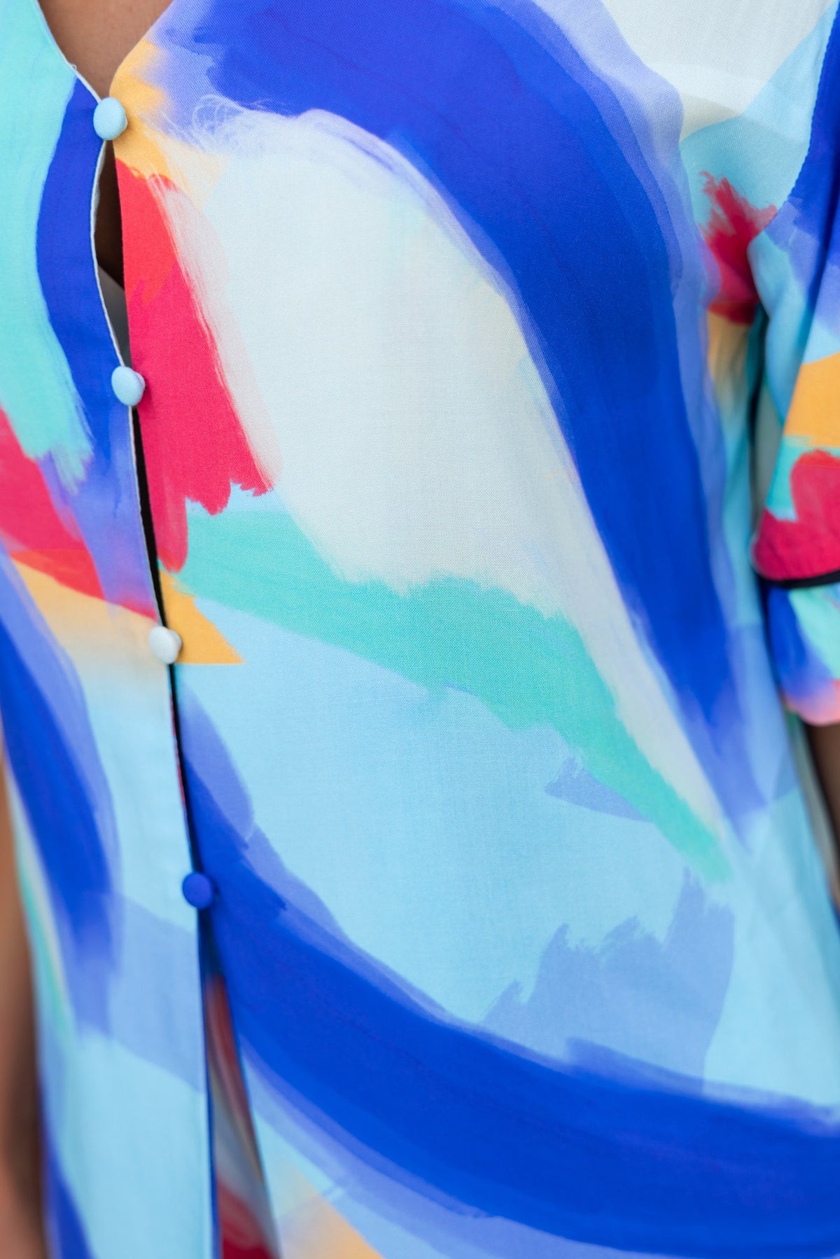 Colorful Focus Shirt in blue, pink, and green with button-up front, featuring a relaxed fit and light, breathable fabric.