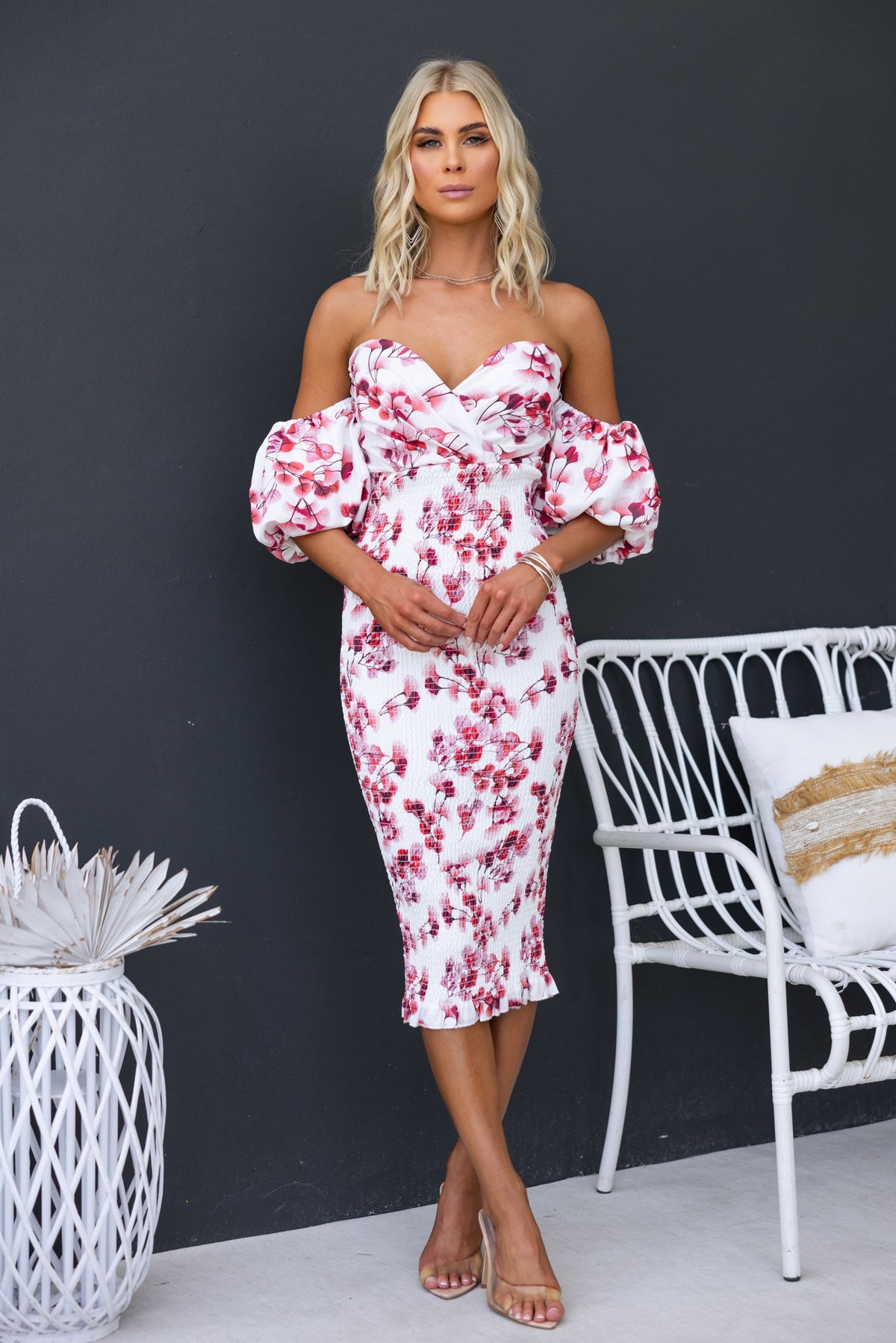Gwenna Midi Dress featuring off-shoulder neckline and floral bodycon design, model wearing size 6/XS.