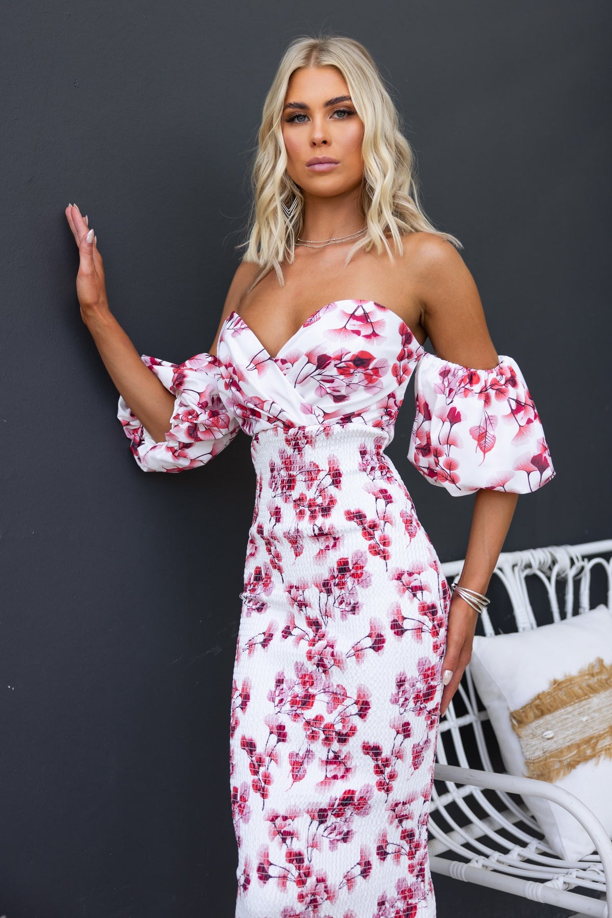 Gwenna Midi Dress featuring off-shoulder neckline, floral print, and elastic fittings for a stylish summer look.