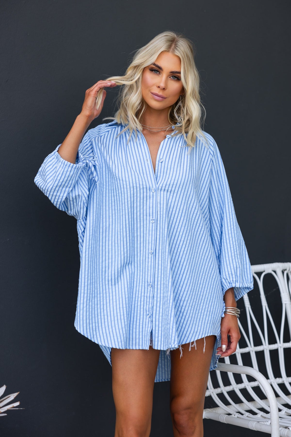 Oversized blue and white striped Sorbet Shirt with button-up front and tie detail at sleeves.