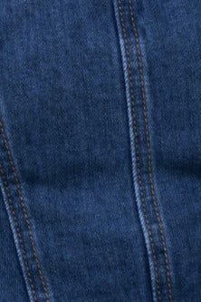 Close-up of Sierra Jeans denim fabric showing rich blue color and detailed stitching, ideal for stylish wide-leg fits.