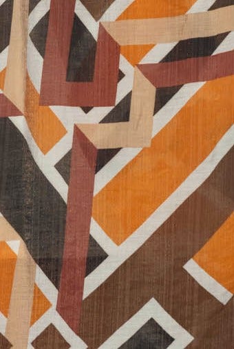 Colorful geometric pattern in warm tones of orange, brown, and cream with intersecting shapes and lines.