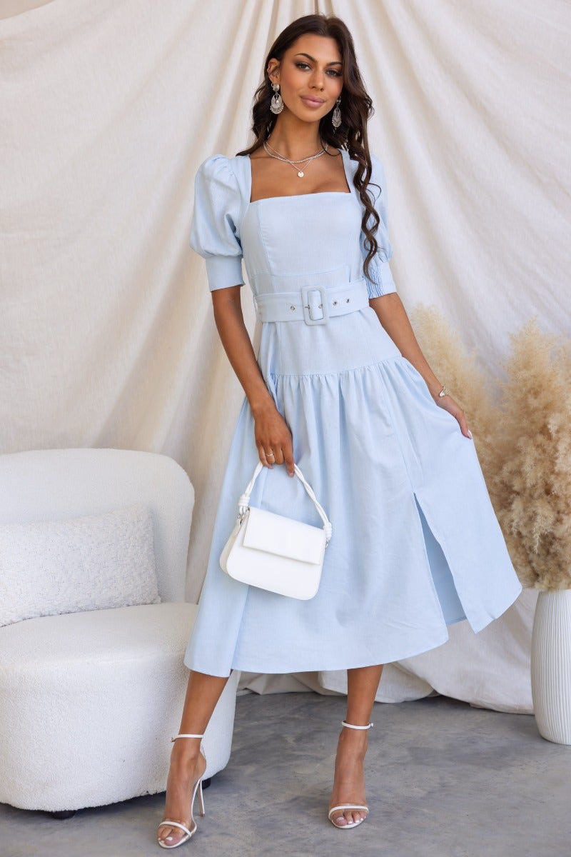 Light blue linen blend midi dress with square neckline, elastic cuffs, removable belt, and front split.