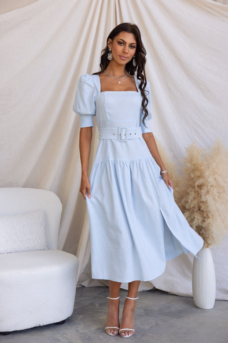 Light blue linen blend Innis midi dress with square neckline, elastic sleeves, fabric belt, and front split.