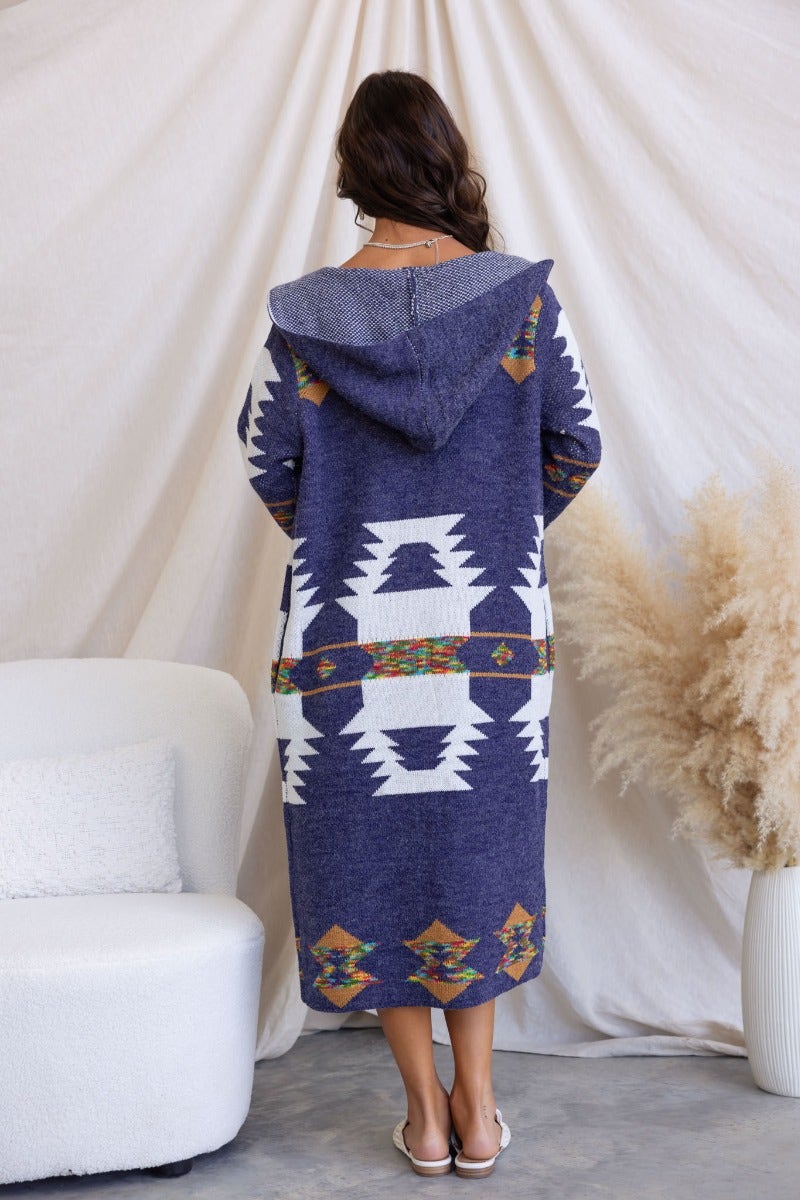 Back view of a longline navy cardigan with a hood and patterned design, perfect for casual wear.
