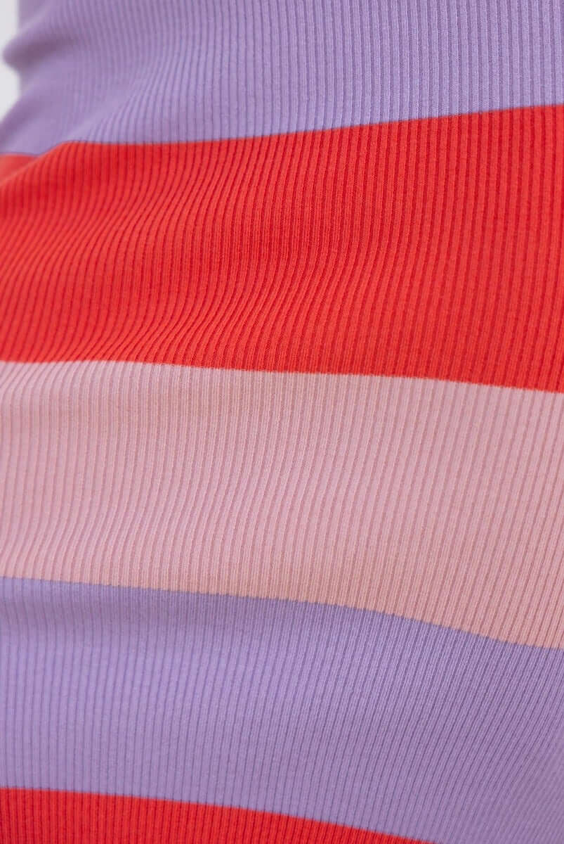 Close-up of Bahlo Midi Dress fabric featuring ribbed knit in vibrant red, purple, and pink stripes.