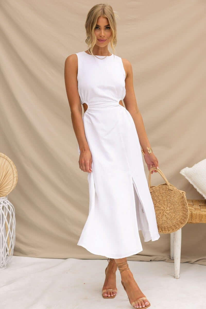 Stylish Rozita Midi Dress featuring a linen blend, cut-out sides, and a front slit, perfect for warm-weather occasions.