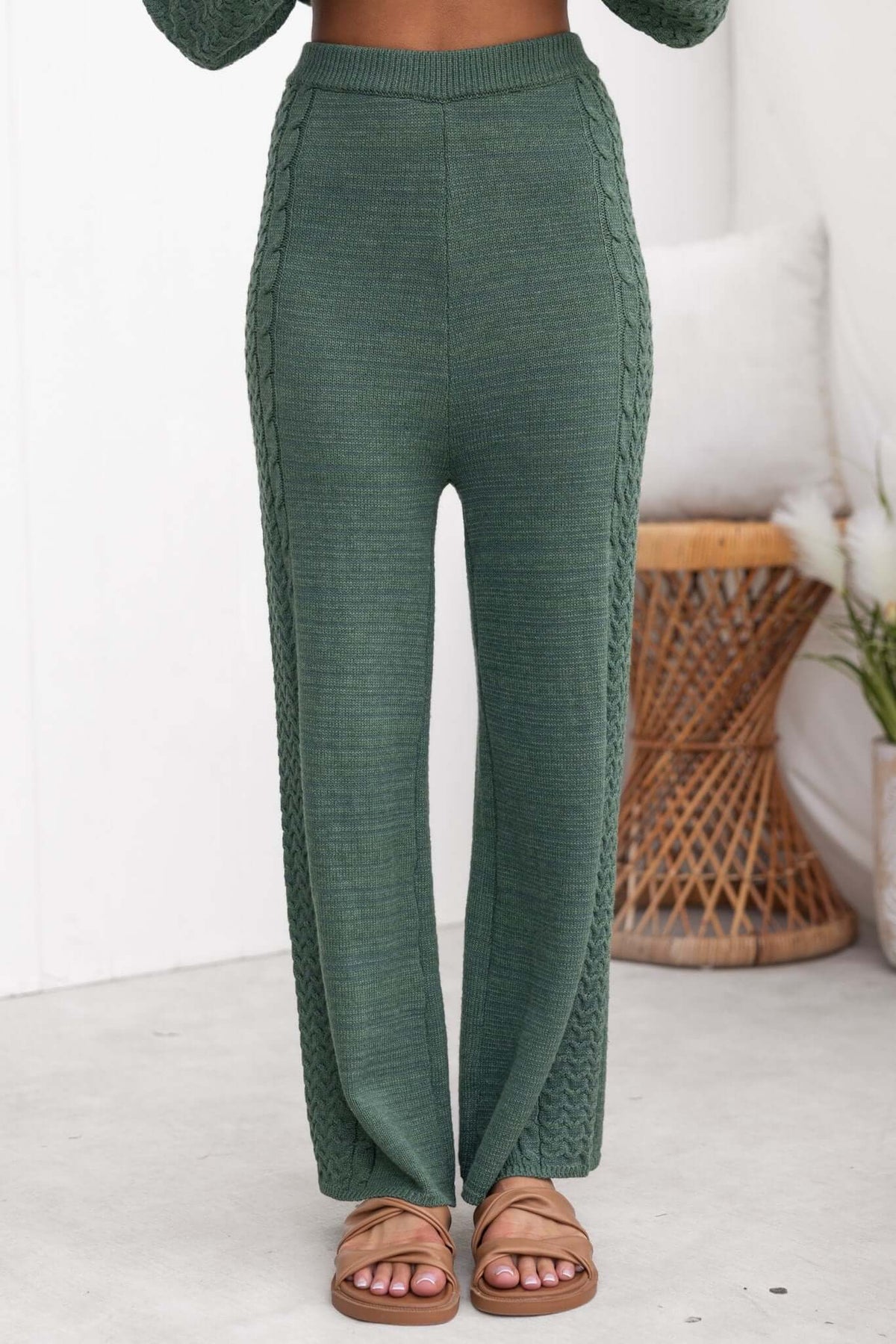 Jesse Pants in green, showcasing a drop crotch style, high waist fit, and knit material with elastic waistband.