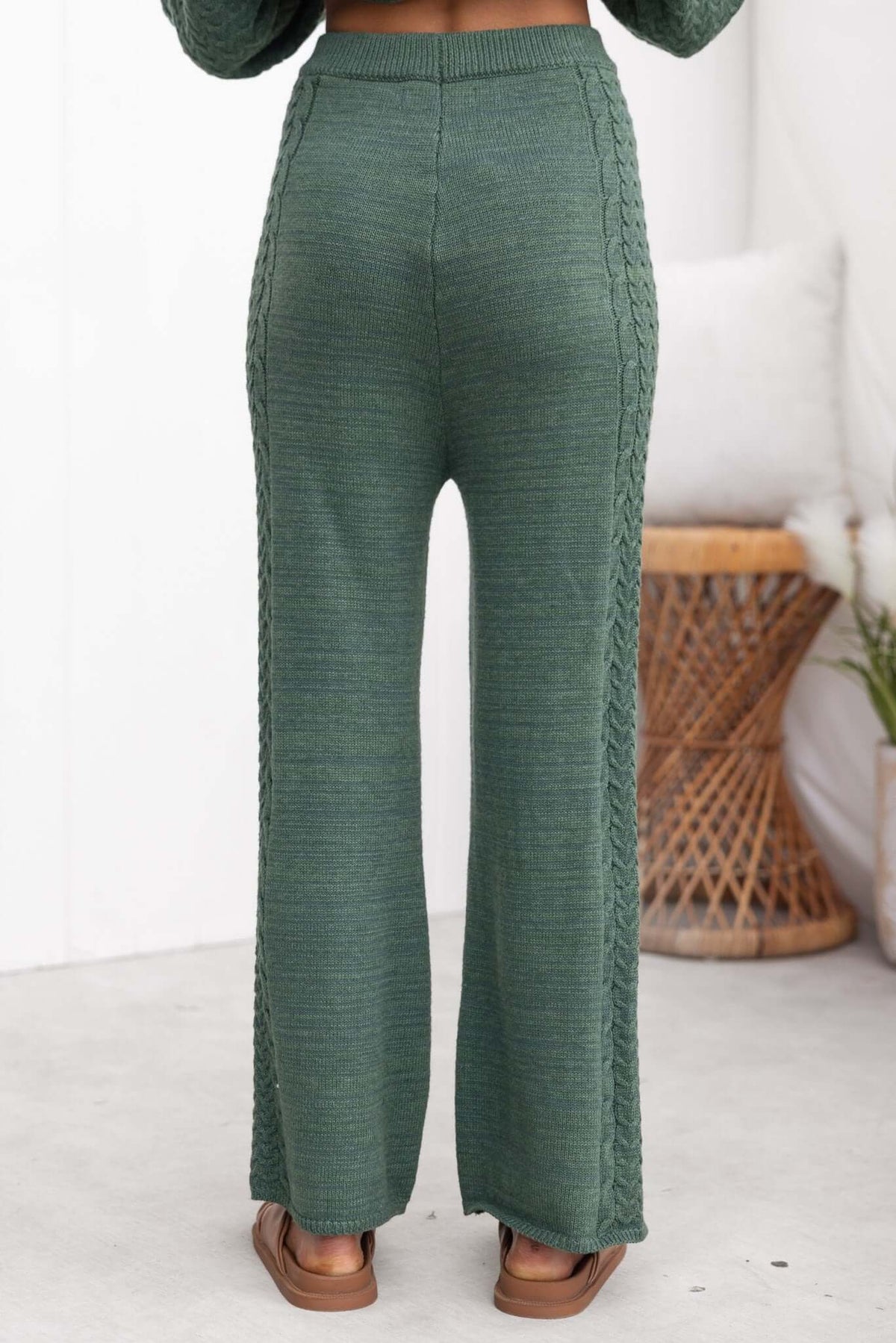 Back view of Jesse Pants in green, showcasing drop crotch style, high waist fit, and knit material.