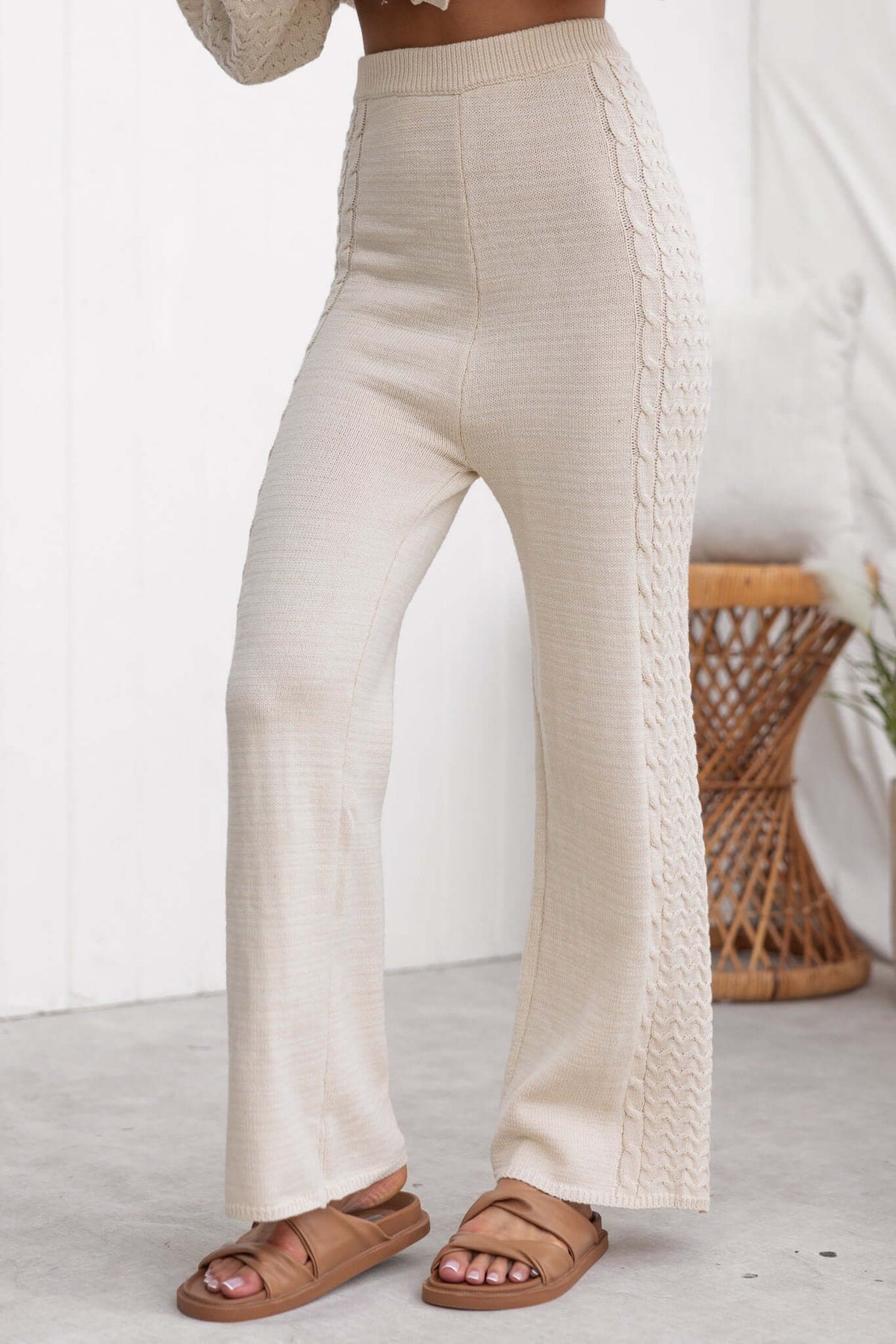 Jesse Pants in cream with a drop crotch style and knitted texture, featuring a high waist and elastic waistband.