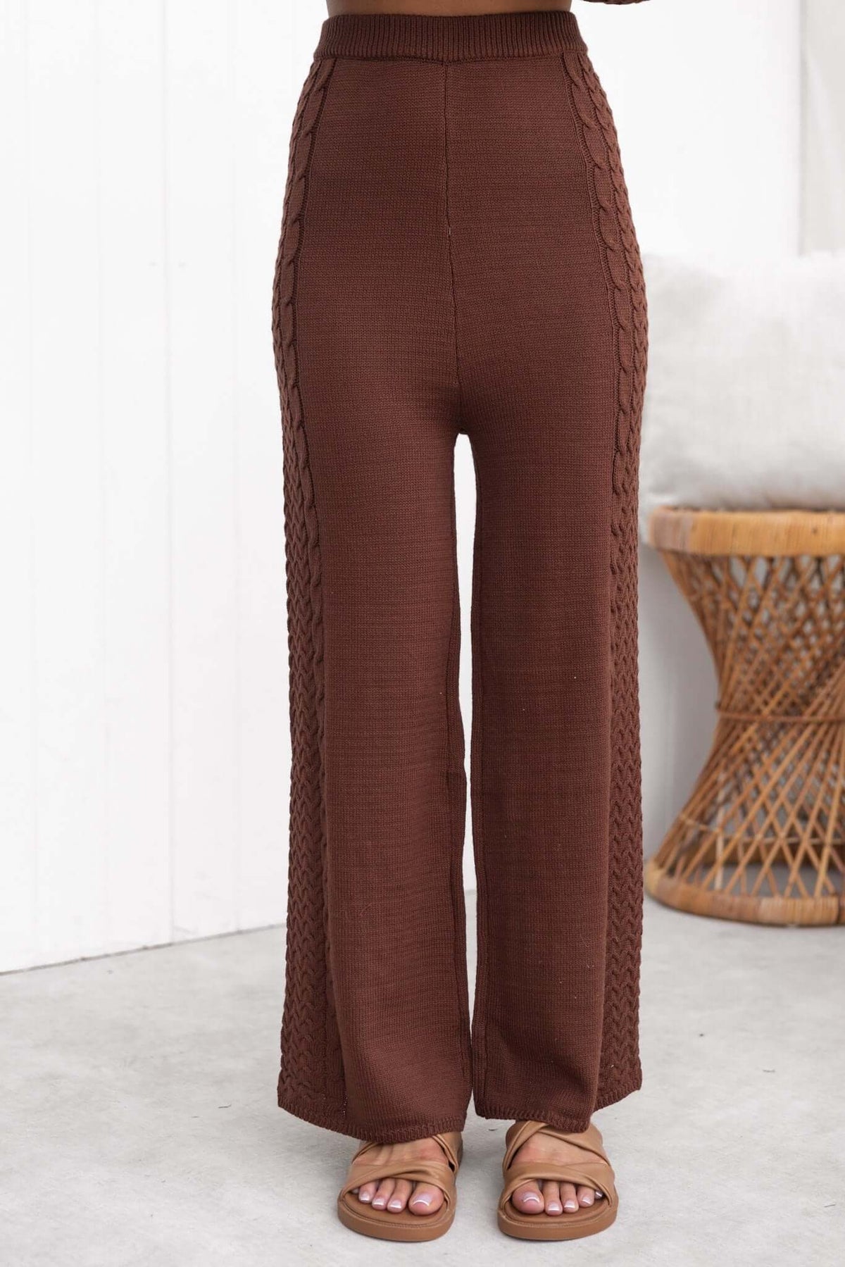 Jesse Pants in brown featuring a drop-crotch style, mid-high waist, and stretchy knit material.