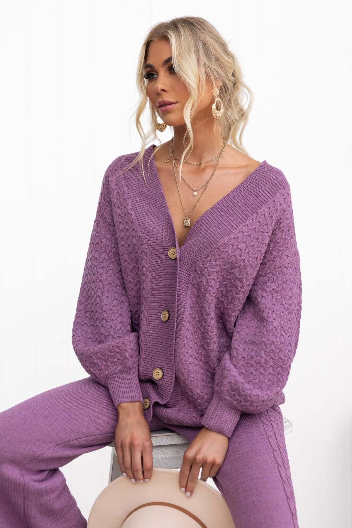 Jesse Cardigan in lavender with V-neckline and button-up front, styled for a relaxed look.