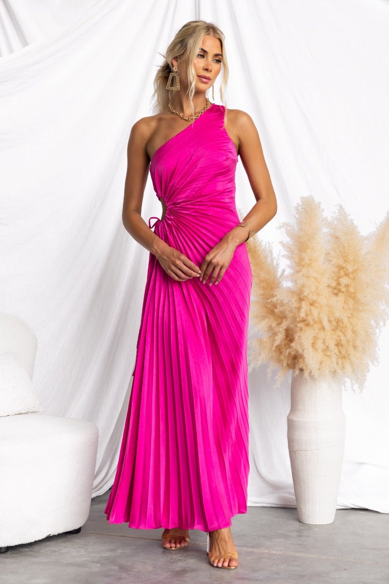 Vibrant pink Ottile Maxi Dress featuring a one-shoulder neckline and stylish cut-out at the waist.