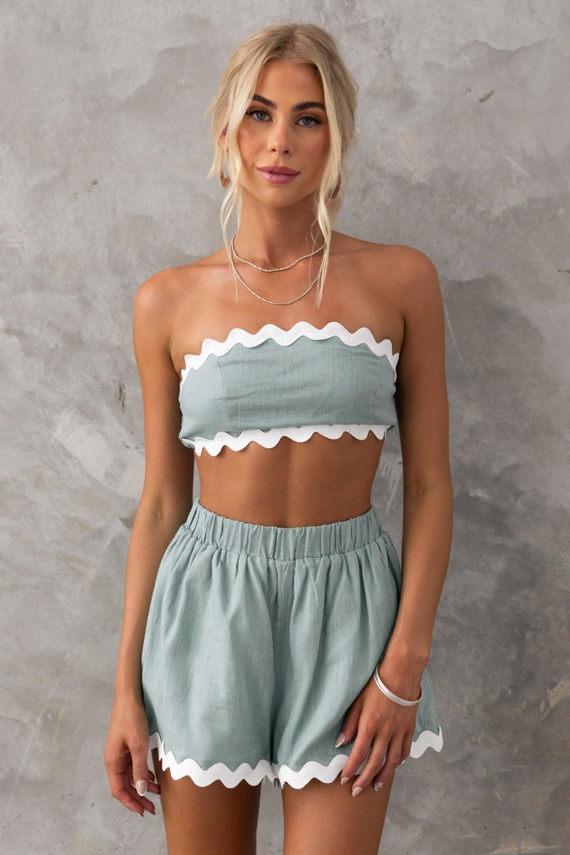 Take It Easy Top: Strapless mint green crop top with white scallop trim, paired with matching shorts.