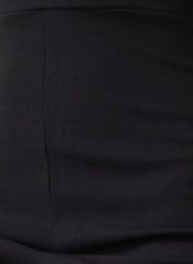 Close-up of black crepe fabric showing smooth texture and stretch, highlighting the Night Lover Jumpsuit's quality.