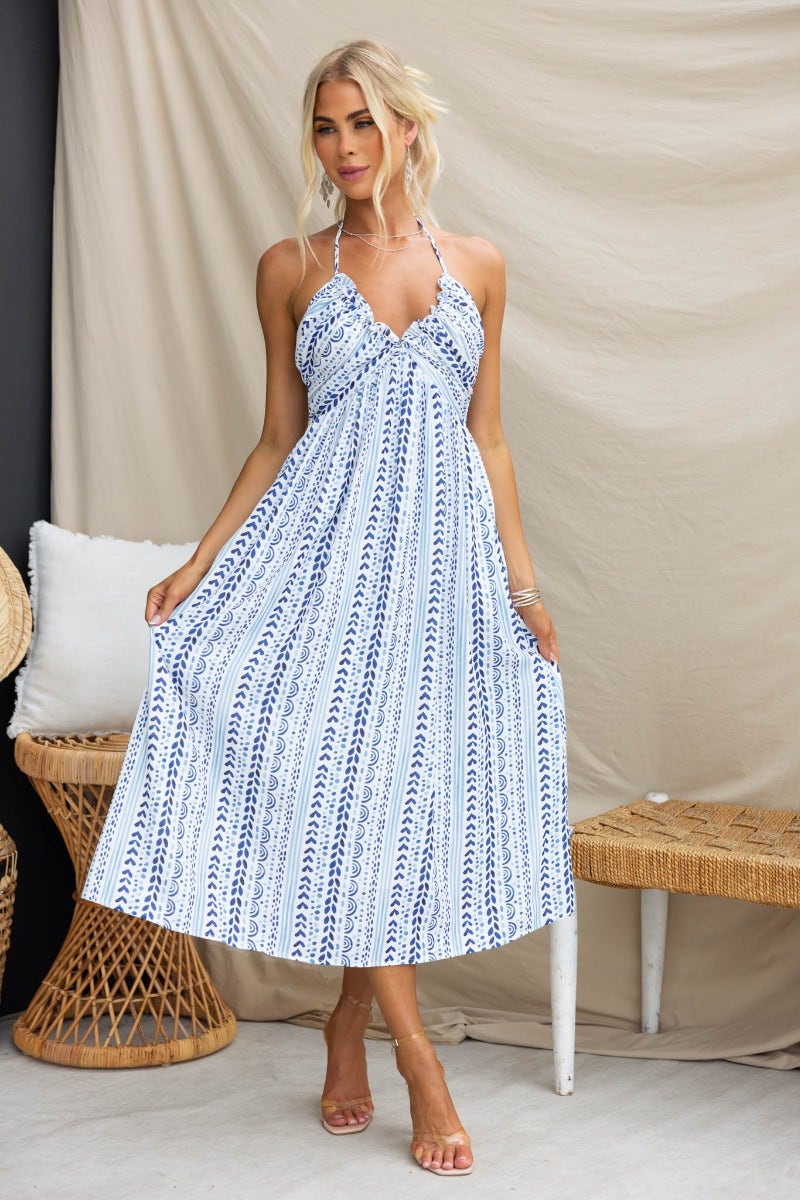 Qano Midi Dress featuring an abstract print, adjustable tie neckline, and a comfortable, lined fit.