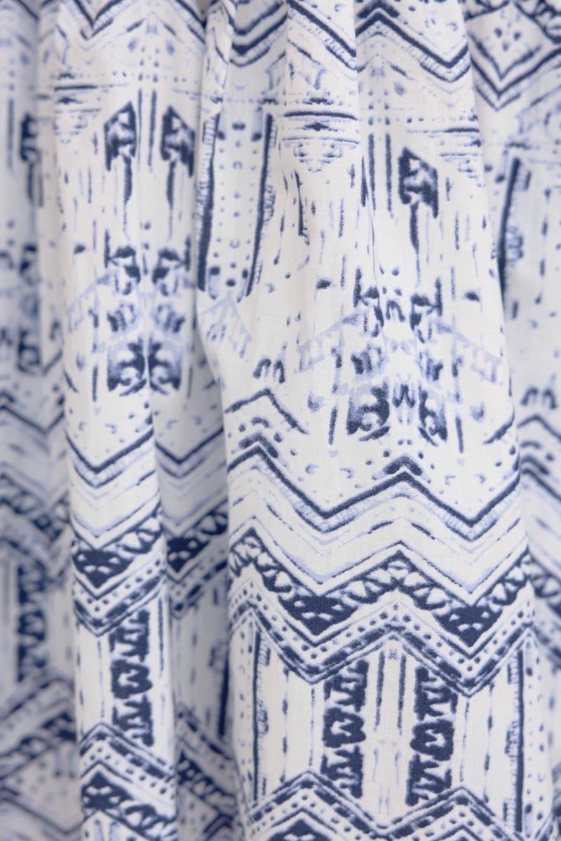 Close-up of Harvie Dress fabric featuring a navy and white geometric pattern on cotton material.