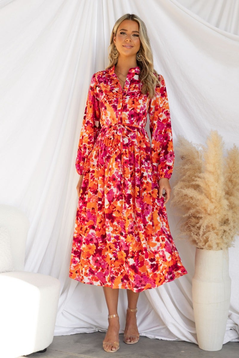 Floral print Andreas Midi Dress with high neckline and button-up bust, styled with elastic cuffs and a flattering fit.