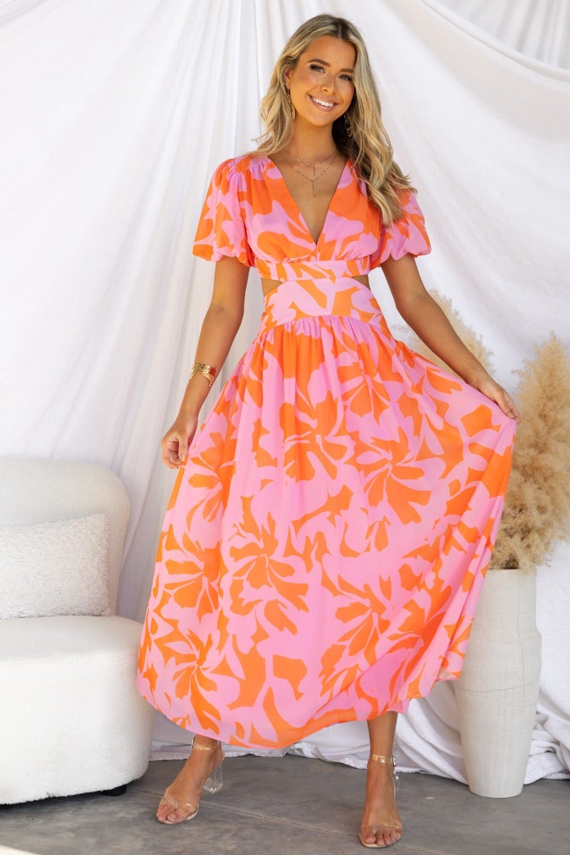 Floral print Marleen maxi dress with V-neckline and cut-out waist, perfect for summer occasions.