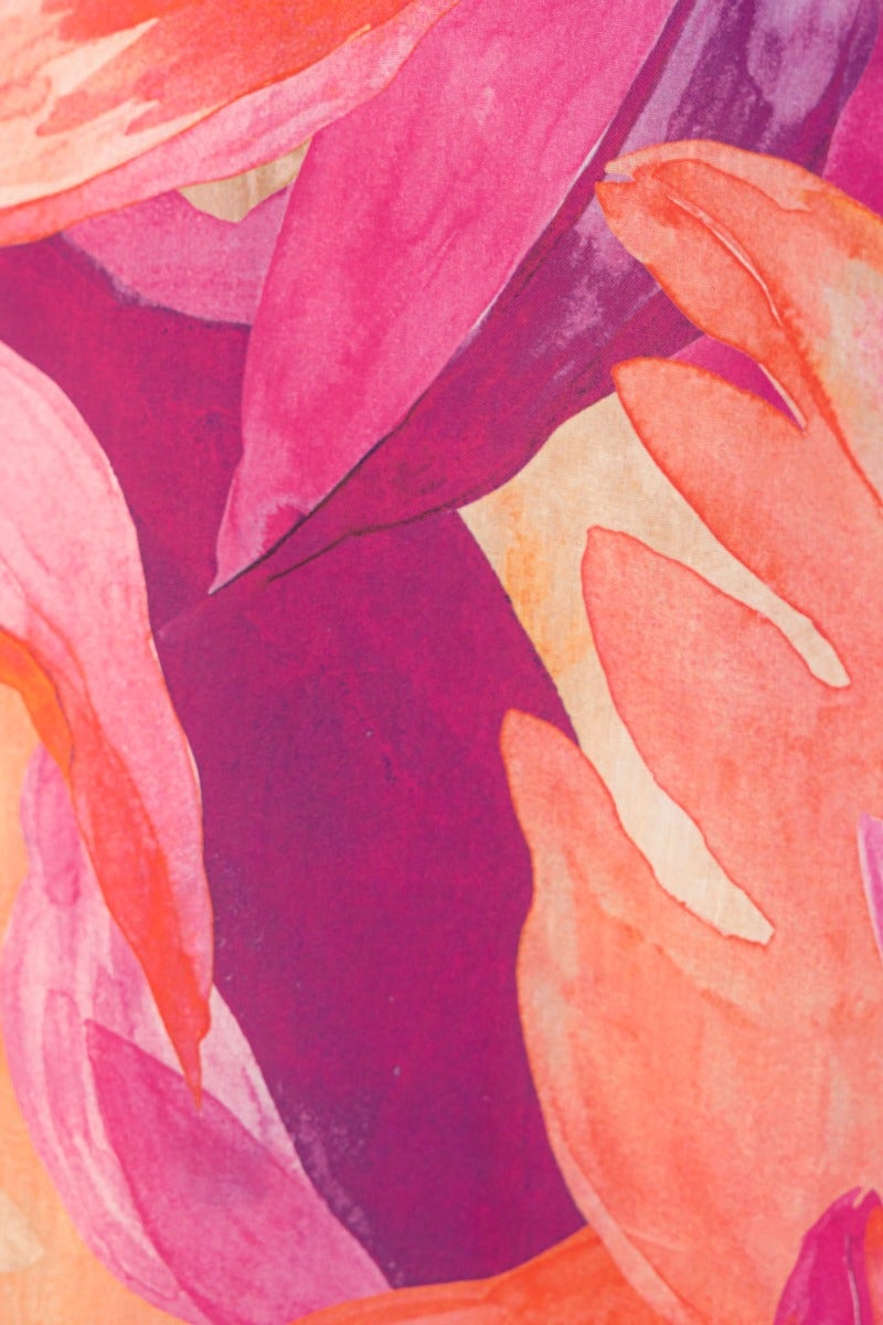 Colorful floral print featuring pink and purple hues, perfect for a vibrant and stylish midi dress.