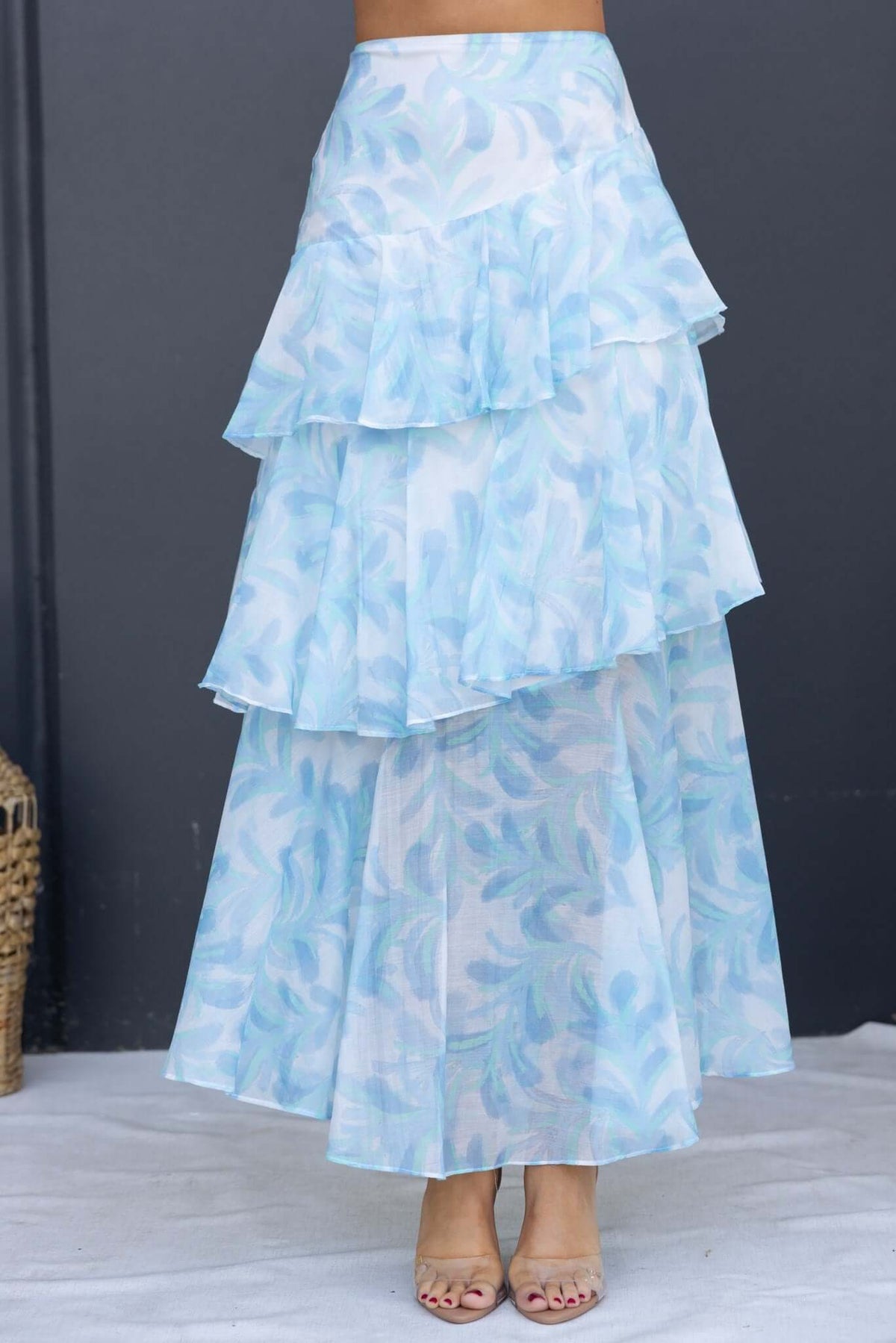 Floral print Saphina maxi skirt with multi-tier ruffle hem in light blue chiffon.