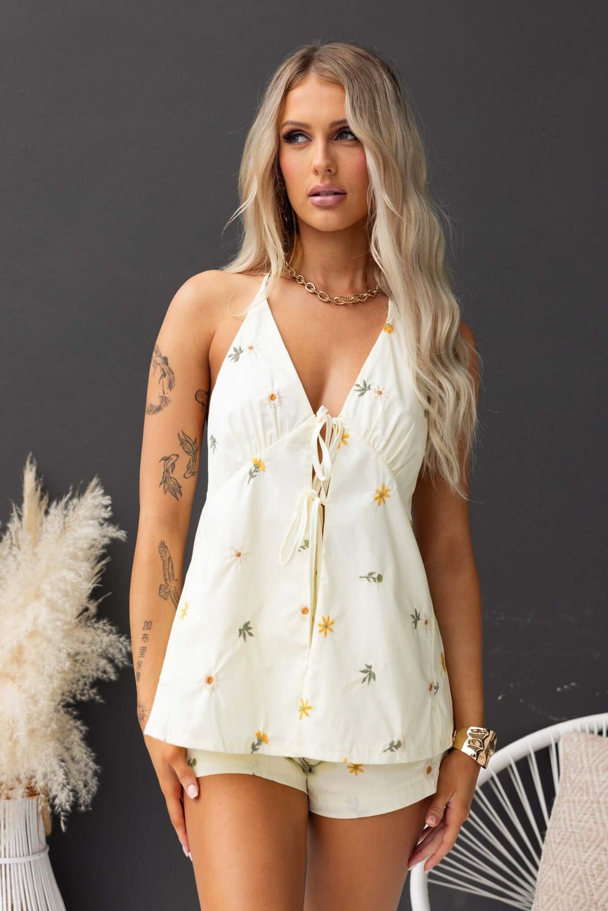 Tori Top featuring a tie neckline, bust & back, with floral print in soft cotton fabric, perfect for summer styling.