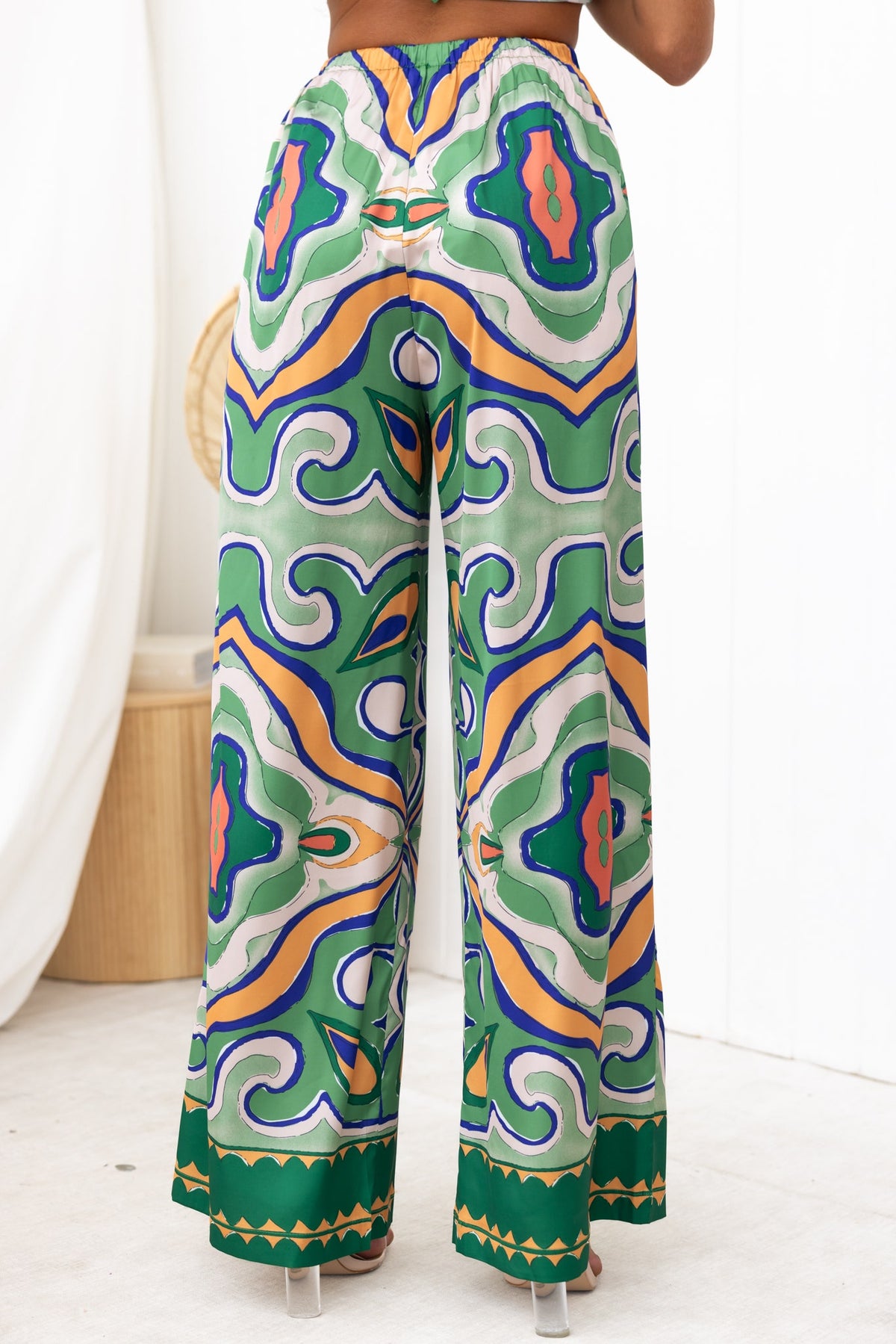 Back view of Up All Night Pants featuring an abstract print, mid-high waist, and elastic waistband with drawstring.