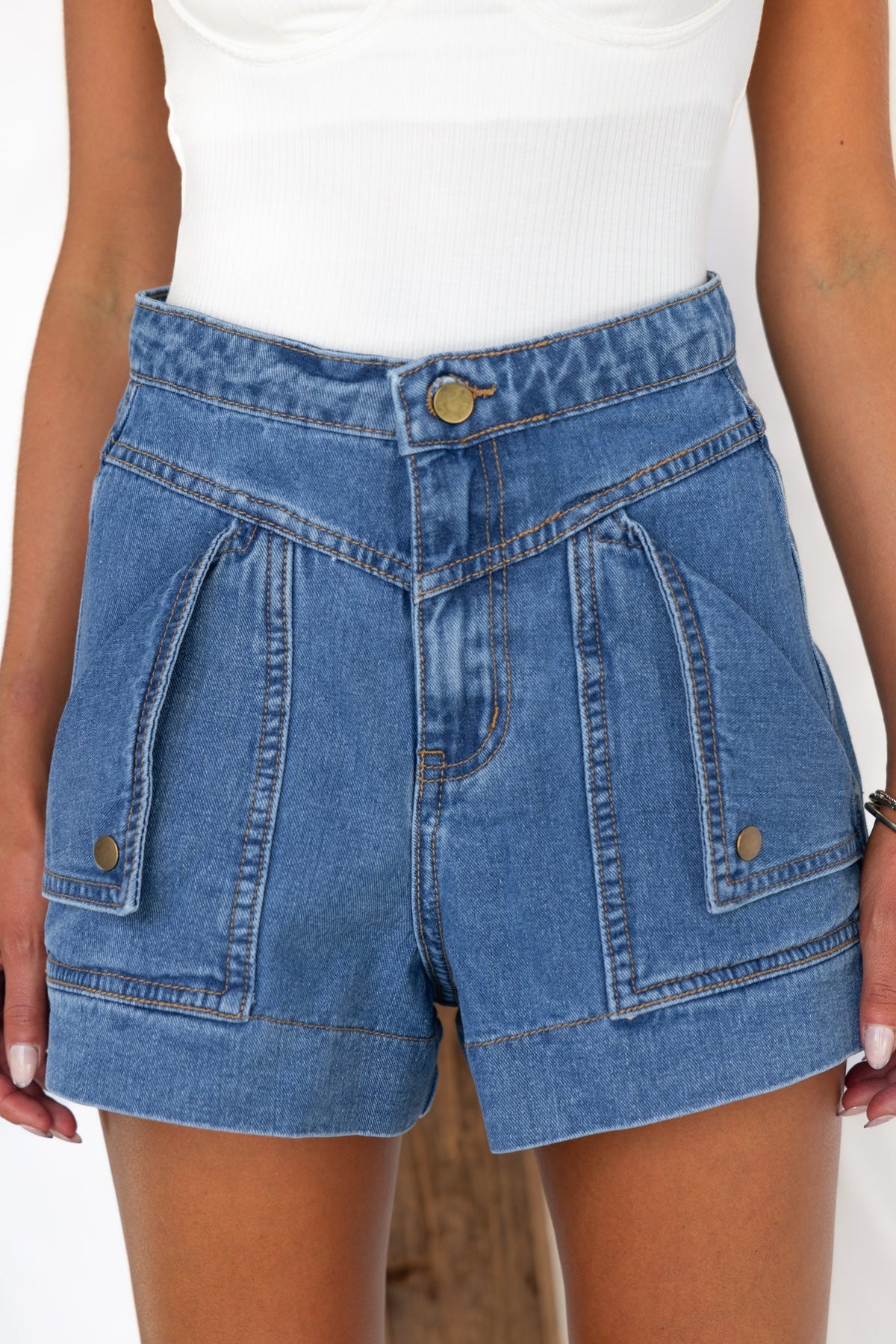 Colden Denim Shorts featuring a mid-high waist fit, front and back pockets, made from 100% cotton.