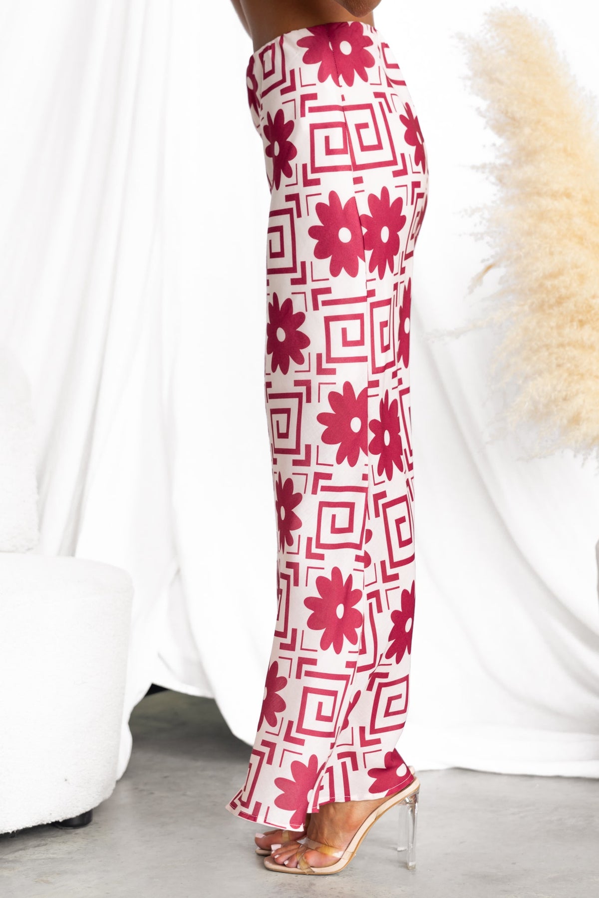 Side view of Solani Maxi Skirt with floral and geometric print, featuring a mid-high waist and a flowy design.