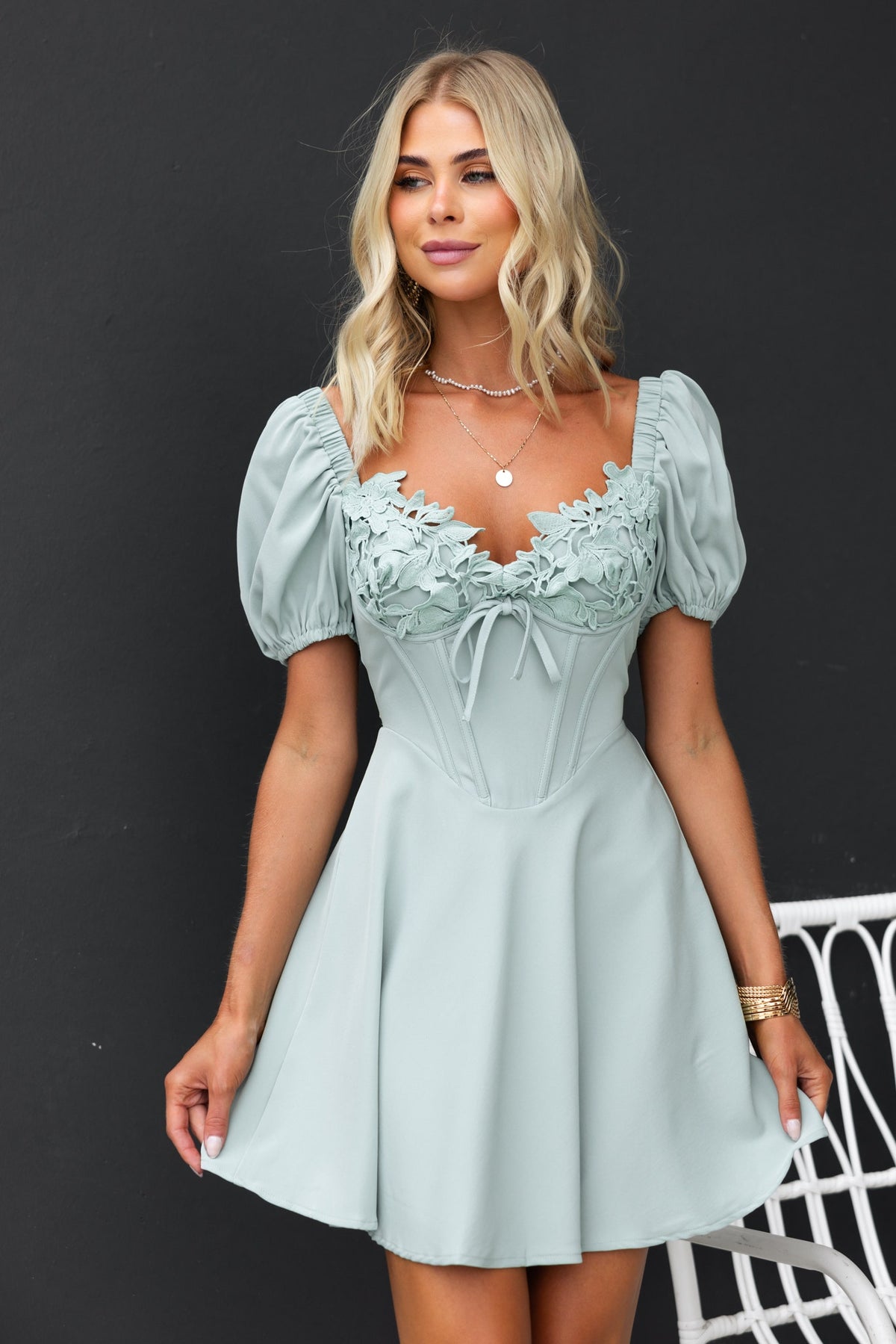 Nonny Dress in mint green with lace detail at bust and elastic sleeves, perfect for stylish summer outings.