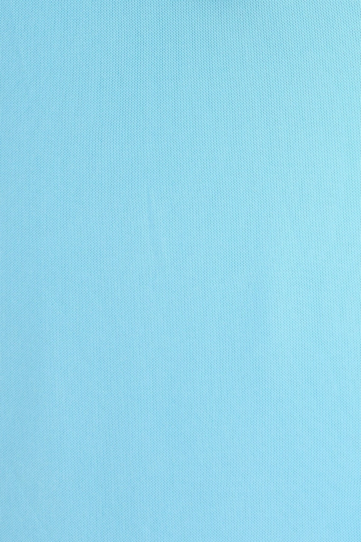 Light blue fabric texture, perfect for a Tropicale Maxi Dress with soft draping material.