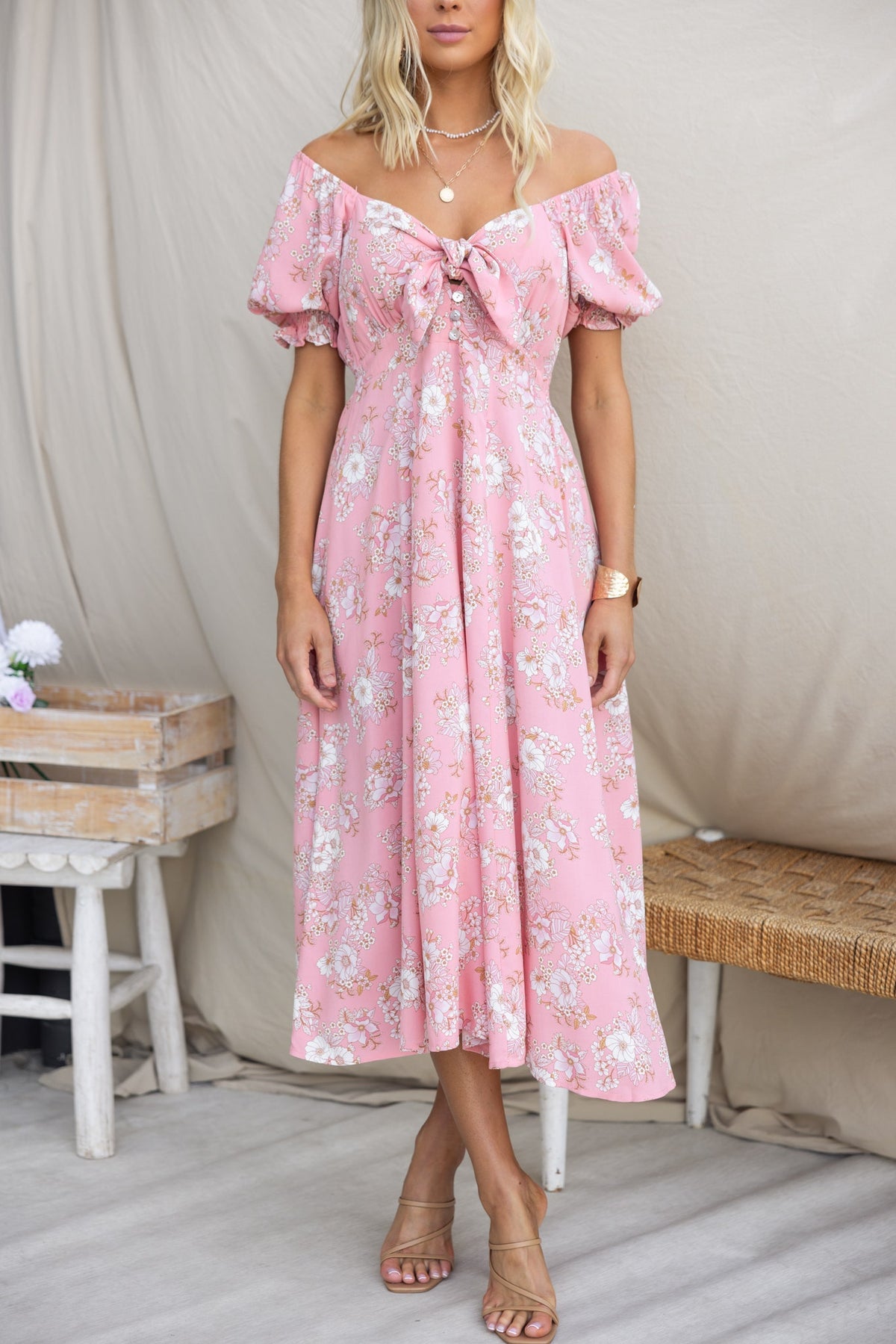 Rayanna Midi Dress with off-the-shoulder design, tie at bust, and floral pattern, perfect for summer occasions.