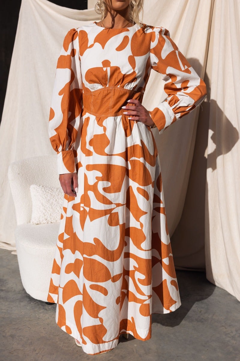 Bohemia maxi dress featuring a multi-colour design, round neckline, and long sleeves, perfect for stylish outings.