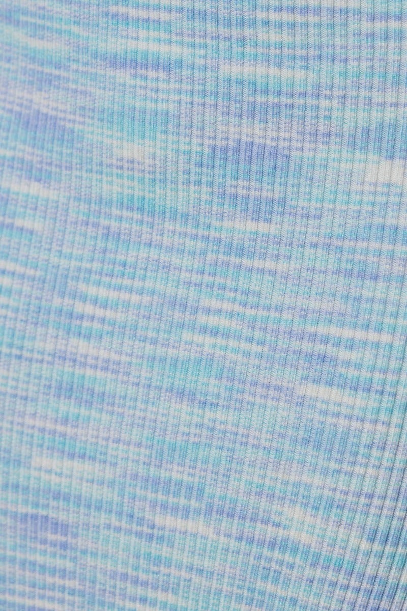 Close-up of ribbed knit fabric in blue tones for Tamias Midi Dress showcasing texture and stretch.