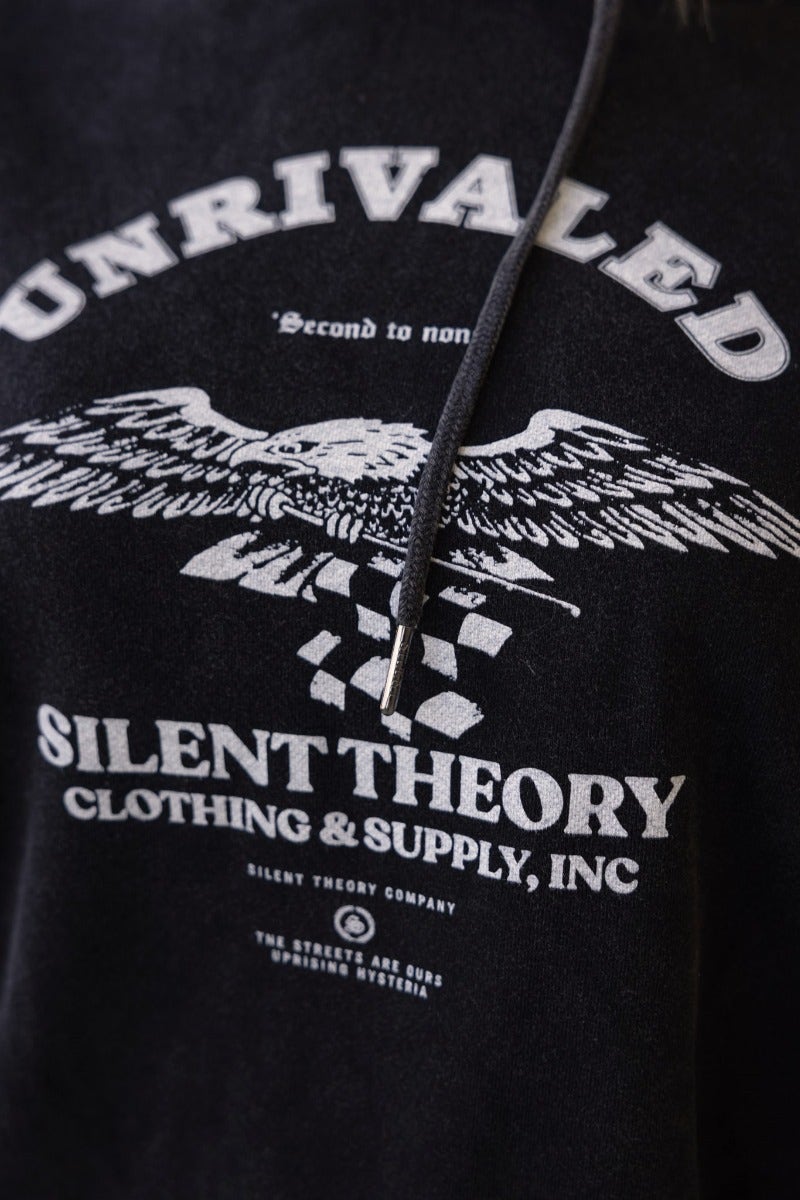 Washed black jumper with 'Unrivaled' print, hood, drawstring, ribbed cuffs, and fleece lining by Silent Theory.